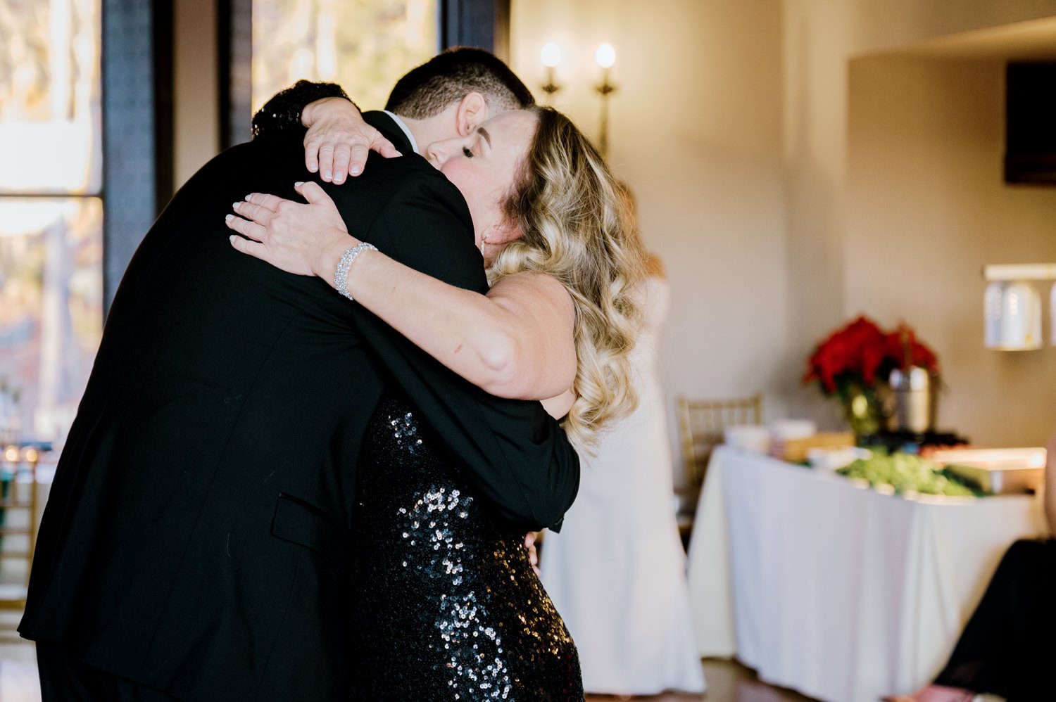 Kelsey and Liron Winter Wedding at Arrow Park, NY
My first wedding at Arrow Park was back in June 2022 when I had the pleasure of photographing Jackie and Aron’s wedding. From that moment, other wedding inquiries and opportunities arose, allowing me to capture the love stories of more wonderful couples at Arrow Park. That’s how I met Kelsey. Kelsey is the sales manager at Arrow Park, and since then, she has been a fan of my work. When it came time to plan her own wedding, I was delighted and honored that she chose me to document her beautiful celebration at Arrow Park.
Kelsey was well-prepared for the chilly weather, as she was getting married in December, so the wedding took place inside the mansion. When I arrived, Kelsey was finishing up her hair and makeup, just about ready to put on her dress. Families started to arrive, filling the space with warm greetings and laughter—one of my favorite scenes to witness on a wedding morning. Kelsey stepped into her dress, slipped on her gloves, and completed her final wedding preparations. She sparkled even more than the diamond on her finger as she walked over to see her groom.
As Kelsey walked down the aisle escorted by her father, emotions filled the room. Tears welled up in the eyes of their family and friends while Liron stood at the altar, watching her with a big smile. With their loved ones witnessing, Kelsey and Liron exchanged vows and sealed their marriage with a kiss.
Cocktail hour began with delicious hors d'oeuvres and drinks in hand, as guests excitedly welcomed the newlyweds into the room. Midway through the reception, Albanian dancers performed a traditional folk dance, bringing everyone to the dance floor as one big family. The night was filled with joy, laughter, and celebration. As all fun times do, the evening eventually came to an end, and we sent off Kelsey and Liron with a magical sparkler exit.
Winter Wedding Tips for Arrow Park, NY:
1. Embrace the Indoor Spaces: Arrow Park’s mansion provides an elegant and cozy setting for a winter wedding. The warm fireplaces and historic charm create a romantic atmosphere perfect for a chilly December day.
2. Prepare for the Cold: If you’re planning a winter wedding, consider stylish layers like faux fur wraps, long-sleeved dresses, or elegant gloves to stay warm while looking stunning.
3. Plan for Early Sunset: Winter days are shorter, so plan your timeline accordingly to make the most of natural light for photos. Consider a first look to capture beautiful portraits before it gets dark.
4. Add Seasonal Touches: Enhance the winter wedding ambiance with seasonal decor, such as candles, string lights, evergreen arrangements, and warm color palettes to complement the cozy indoor setting.
5. Offer Warm Beverages: Keep guests comfortable by serving hot cocoa, mulled wine, or warm cider during cocktail hour to add a festive and welcoming touch.
Kelsey and Liron’s wedding was a perfect example of how a winter celebration at Arrow Park can be both intimate and breathtaking. I was honored to capture their special day and look forward to photographing more magical winter weddings in this beautiful venue.
Kelsey and Liron's Arrow Park NY Wedding documented by Karis from Hey Karis New York, Brooklyn, Hudson Valley NY and Catskills NY and NJ Wedding and NYC Elopement Photographer.
