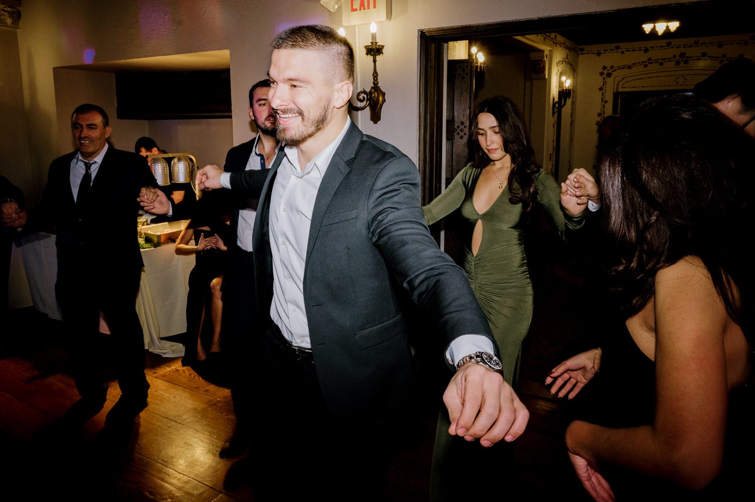 Kelsey and Liron Winter Wedding at Arrow Park, NY
My first wedding at Arrow Park was back in June 2022 when I had the pleasure of photographing Jackie and Aron’s wedding. From that moment, other wedding inquiries and opportunities arose, allowing me to capture the love stories of more wonderful couples at Arrow Park. That’s how I met Kelsey. Kelsey is the sales manager at Arrow Park, and since then, she has been a fan of my work. When it came time to plan her own wedding, I was delighted and honored that she chose me to document her beautiful celebration at Arrow Park.
Kelsey was well-prepared for the chilly weather, as she was getting married in December, so the wedding took place inside the mansion. When I arrived, Kelsey was finishing up her hair and makeup, just about ready to put on her dress. Families started to arrive, filling the space with warm greetings and laughter—one of my favorite scenes to witness on a wedding morning. Kelsey stepped into her dress, slipped on her gloves, and completed her final wedding preparations. She sparkled even more than the diamond on her finger as she walked over to see her groom.
As Kelsey walked down the aisle escorted by her father, emotions filled the room. Tears welled up in the eyes of their family and friends while Liron stood at the altar, watching her with a big smile. With their loved ones witnessing, Kelsey and Liron exchanged vows and sealed their marriage with a kiss.
Cocktail hour began with delicious hors d'oeuvres and drinks in hand, as guests excitedly welcomed the newlyweds into the room. Midway through the reception, Albanian dancers performed a traditional folk dance, bringing everyone to the dance floor as one big family. The night was filled with joy, laughter, and celebration. As all fun times do, the evening eventually came to an end, and we sent off Kelsey and Liron with a magical sparkler exit.
Winter Wedding Tips for Arrow Park, NY:
1. Embrace the Indoor Spaces: Arrow Park’s mansion provides an elegant and cozy setting for a winter wedding. The warm fireplaces and historic charm create a romantic atmosphere perfect for a chilly December day.
2. Prepare for the Cold: If you’re planning a winter wedding, consider stylish layers like faux fur wraps, long-sleeved dresses, or elegant gloves to stay warm while looking stunning.
3. Plan for Early Sunset: Winter days are shorter, so plan your timeline accordingly to make the most of natural light for photos. Consider a first look to capture beautiful portraits before it gets dark.
4. Add Seasonal Touches: Enhance the winter wedding ambiance with seasonal decor, such as candles, string lights, evergreen arrangements, and warm color palettes to complement the cozy indoor setting.
5. Offer Warm Beverages: Keep guests comfortable by serving hot cocoa, mulled wine, or warm cider during cocktail hour to add a festive and welcoming touch.
Kelsey and Liron’s wedding was a perfect example of how a winter celebration at Arrow Park can be both intimate and breathtaking. I was honored to capture their special day and look forward to photographing more magical winter weddings in this beautiful venue.
Kelsey and Liron's Arrow Park NY Wedding documented by Karis from Hey Karis New York, Brooklyn, Hudson Valley NY and Catskills NY and NJ Wedding and NYC Elopement Photographer.
