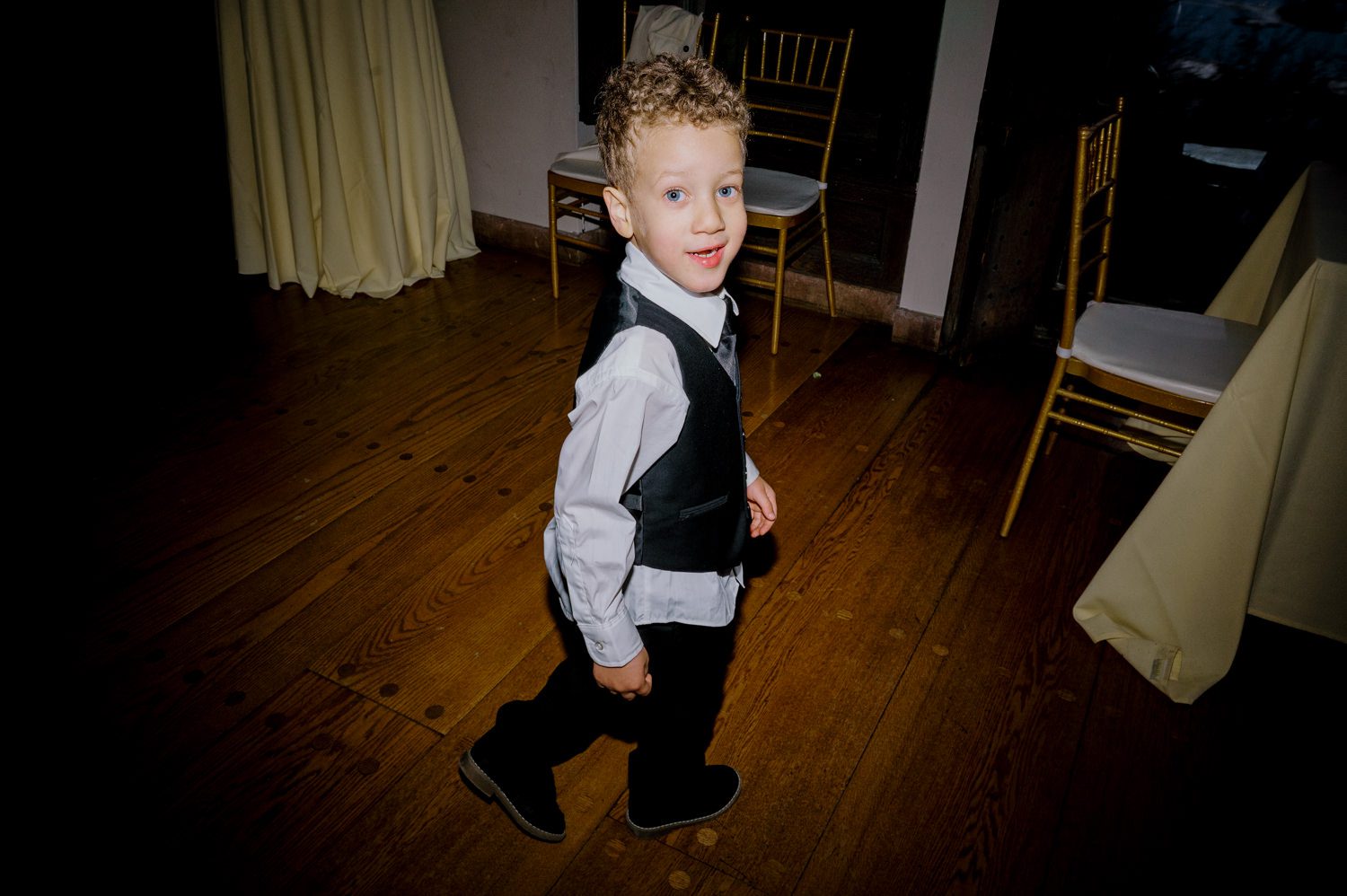 Kelsey and Liron Winter Wedding at Arrow Park, NY
My first wedding at Arrow Park was back in June 2022 when I had the pleasure of photographing Jackie and Aron’s wedding. From that moment, other wedding inquiries and opportunities arose, allowing me to capture the love stories of more wonderful couples at Arrow Park. That’s how I met Kelsey. Kelsey is the sales manager at Arrow Park, and since then, she has been a fan of my work. When it came time to plan her own wedding, I was delighted and honored that she chose me to document her beautiful celebration at Arrow Park.
Kelsey was well-prepared for the chilly weather, as she was getting married in December, so the wedding took place inside the mansion. When I arrived, Kelsey was finishing up her hair and makeup, just about ready to put on her dress. Families started to arrive, filling the space with warm greetings and laughter—one of my favorite scenes to witness on a wedding morning. Kelsey stepped into her dress, slipped on her gloves, and completed her final wedding preparations. She sparkled even more than the diamond on her finger as she walked over to see her groom.
As Kelsey walked down the aisle escorted by her father, emotions filled the room. Tears welled up in the eyes of their family and friends while Liron stood at the altar, watching her with a big smile. With their loved ones witnessing, Kelsey and Liron exchanged vows and sealed their marriage with a kiss.
Cocktail hour began with delicious hors d'oeuvres and drinks in hand, as guests excitedly welcomed the newlyweds into the room. Midway through the reception, Albanian dancers performed a traditional folk dance, bringing everyone to the dance floor as one big family. The night was filled with joy, laughter, and celebration. As all fun times do, the evening eventually came to an end, and we sent off Kelsey and Liron with a magical sparkler exit.
Winter Wedding Tips for Arrow Park, NY:
1. Embrace the Indoor Spaces: Arrow Park’s mansion provides an elegant and cozy setting for a winter wedding. The warm fireplaces and historic charm create a romantic atmosphere perfect for a chilly December day.
2. Prepare for the Cold: If you’re planning a winter wedding, consider stylish layers like faux fur wraps, long-sleeved dresses, or elegant gloves to stay warm while looking stunning.
3. Plan for Early Sunset: Winter days are shorter, so plan your timeline accordingly to make the most of natural light for photos. Consider a first look to capture beautiful portraits before it gets dark.
4. Add Seasonal Touches: Enhance the winter wedding ambiance with seasonal decor, such as candles, string lights, evergreen arrangements, and warm color palettes to complement the cozy indoor setting.
5. Offer Warm Beverages: Keep guests comfortable by serving hot cocoa, mulled wine, or warm cider during cocktail hour to add a festive and welcoming touch.
Kelsey and Liron’s wedding was a perfect example of how a winter celebration at Arrow Park can be both intimate and breathtaking. I was honored to capture their special day and look forward to photographing more magical winter weddings in this beautiful venue.
Kelsey and Liron's Arrow Park NY Wedding documented by Karis from Hey Karis New York, Brooklyn, Hudson Valley NY and Catskills NY and NJ Wedding and NYC Elopement Photographer.
