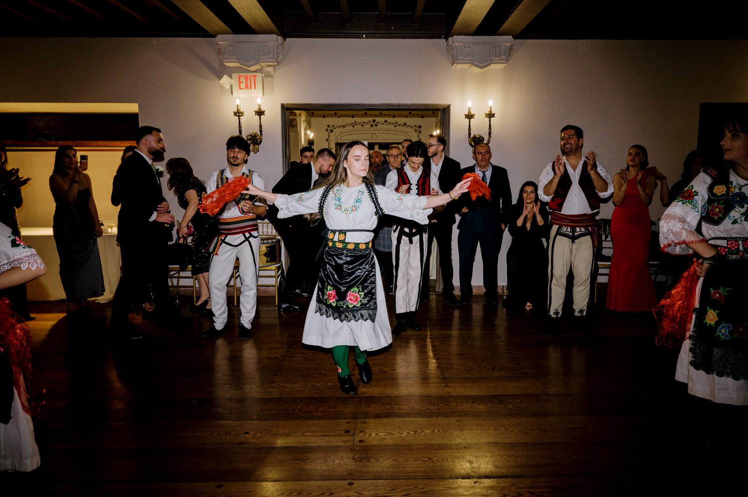 Kelsey and Liron Winter Wedding at Arrow Park, NY
My first wedding at Arrow Park was back in June 2022 when I had the pleasure of photographing Jackie and Aron’s wedding. From that moment, other wedding inquiries and opportunities arose, allowing me to capture the love stories of more wonderful couples at Arrow Park. That’s how I met Kelsey. Kelsey is the sales manager at Arrow Park, and since then, she has been a fan of my work. When it came time to plan her own wedding, I was delighted and honored that she chose me to document her beautiful celebration at Arrow Park.
Kelsey was well-prepared for the chilly weather, as she was getting married in December, so the wedding took place inside the mansion. When I arrived, Kelsey was finishing up her hair and makeup, just about ready to put on her dress. Families started to arrive, filling the space with warm greetings and laughter—one of my favorite scenes to witness on a wedding morning. Kelsey stepped into her dress, slipped on her gloves, and completed her final wedding preparations. She sparkled even more than the diamond on her finger as she walked over to see her groom.
As Kelsey walked down the aisle escorted by her father, emotions filled the room. Tears welled up in the eyes of their family and friends while Liron stood at the altar, watching her with a big smile. With their loved ones witnessing, Kelsey and Liron exchanged vows and sealed their marriage with a kiss.
Cocktail hour began with delicious hors d'oeuvres and drinks in hand, as guests excitedly welcomed the newlyweds into the room. Midway through the reception, Albanian dancers performed a traditional folk dance, bringing everyone to the dance floor as one big family. The night was filled with joy, laughter, and celebration. As all fun times do, the evening eventually came to an end, and we sent off Kelsey and Liron with a magical sparkler exit.
Winter Wedding Tips for Arrow Park, NY:
1. Embrace the Indoor Spaces: Arrow Park’s mansion provides an elegant and cozy setting for a winter wedding. The warm fireplaces and historic charm create a romantic atmosphere perfect for a chilly December day.
2. Prepare for the Cold: If you’re planning a winter wedding, consider stylish layers like faux fur wraps, long-sleeved dresses, or elegant gloves to stay warm while looking stunning.
3. Plan for Early Sunset: Winter days are shorter, so plan your timeline accordingly to make the most of natural light for photos. Consider a first look to capture beautiful portraits before it gets dark.
4. Add Seasonal Touches: Enhance the winter wedding ambiance with seasonal decor, such as candles, string lights, evergreen arrangements, and warm color palettes to complement the cozy indoor setting.
5. Offer Warm Beverages: Keep guests comfortable by serving hot cocoa, mulled wine, or warm cider during cocktail hour to add a festive and welcoming touch.
Kelsey and Liron’s wedding was a perfect example of how a winter celebration at Arrow Park can be both intimate and breathtaking. I was honored to capture their special day and look forward to photographing more magical winter weddings in this beautiful venue.
Kelsey and Liron's Arrow Park NY Wedding documented by Karis from Hey Karis New York, Brooklyn, Hudson Valley NY and Catskills NY and NJ Wedding and NYC Elopement Photographer.
